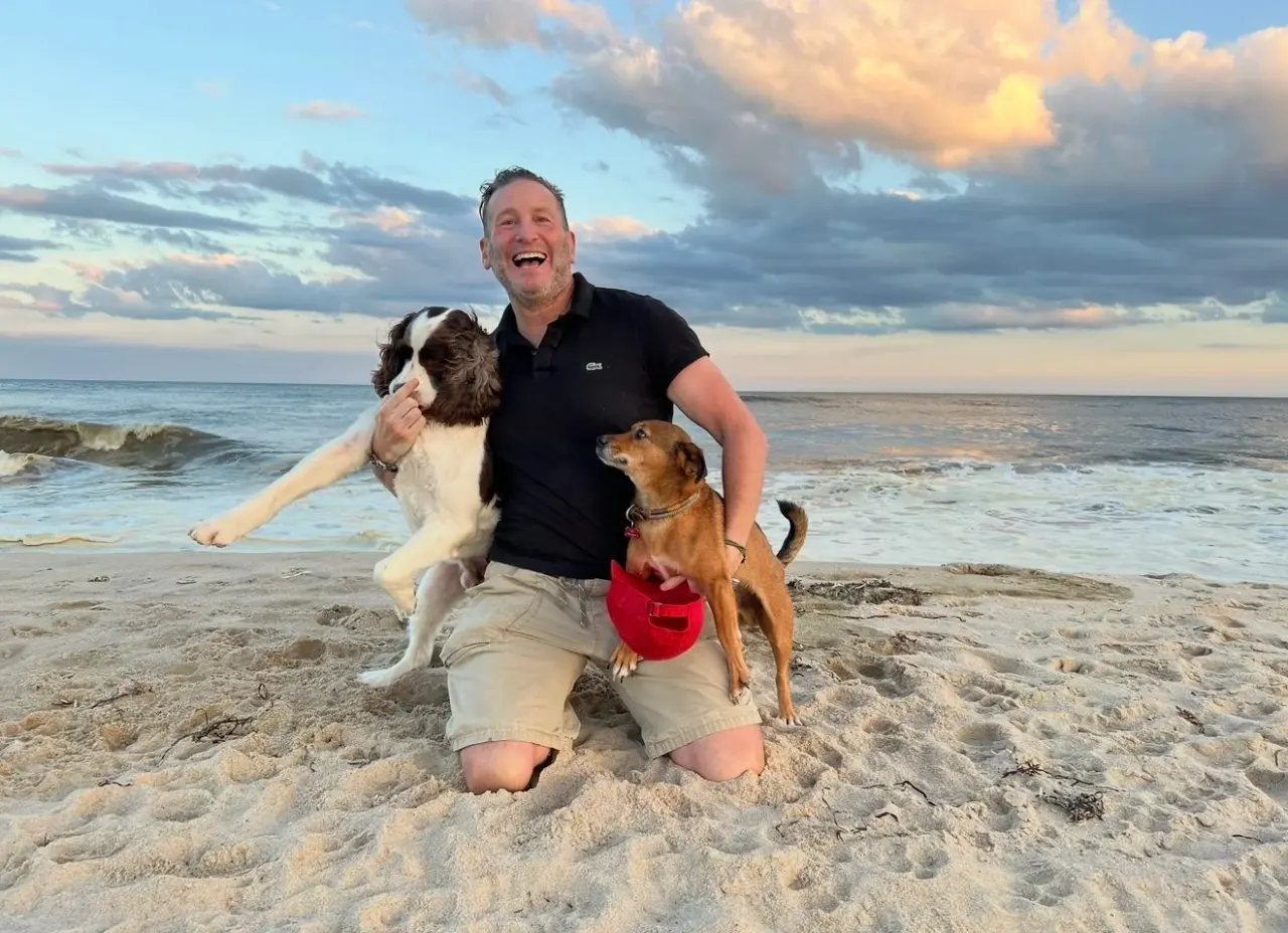 On the beach with two dogs