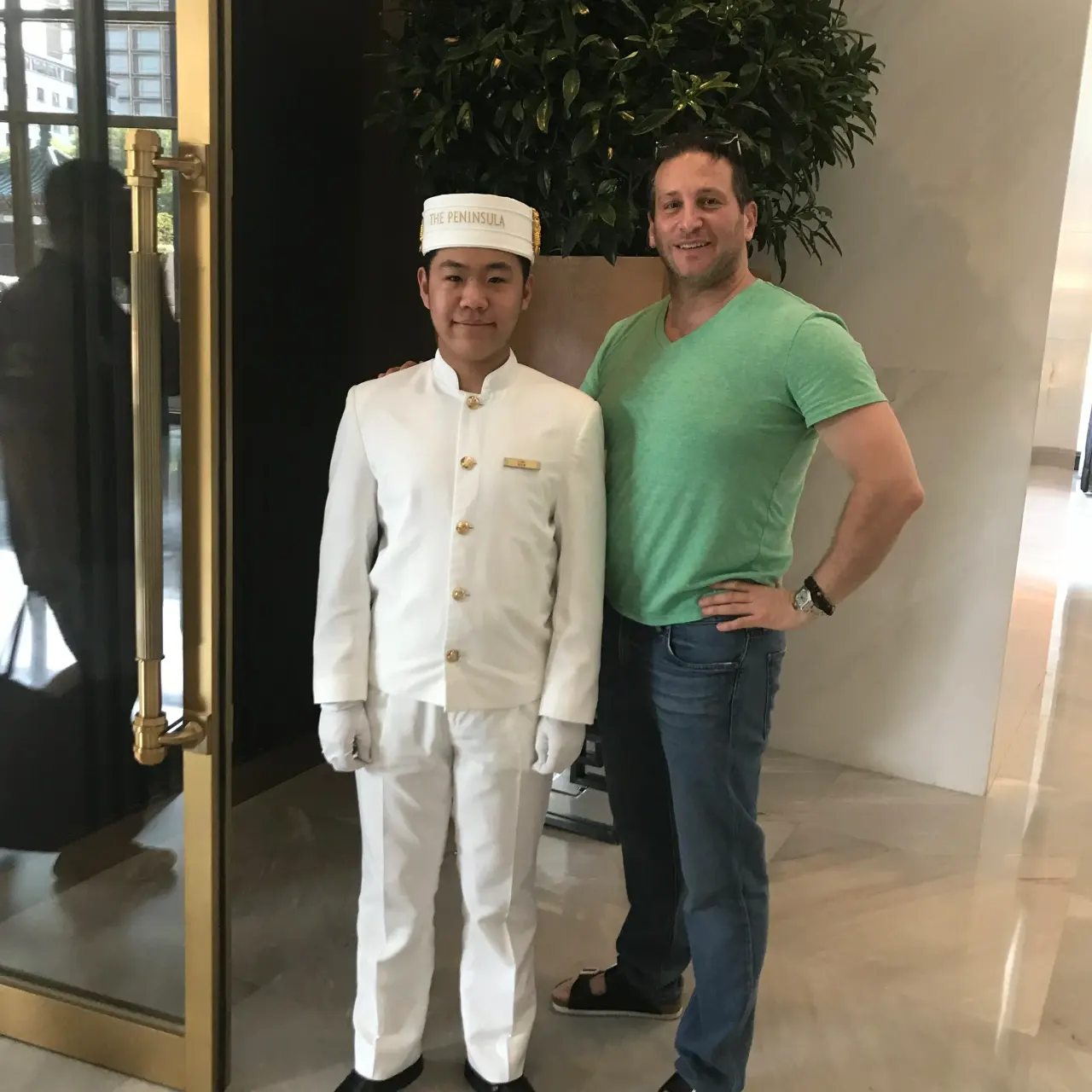With a hotel doorman
