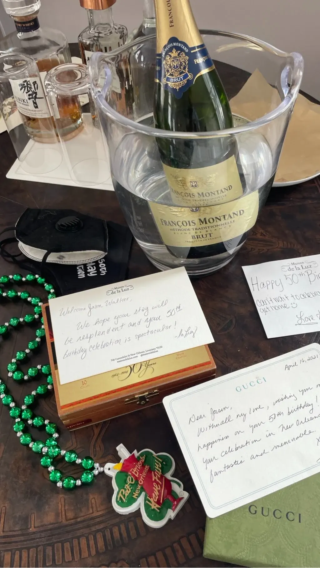 Champagne and a handwritten note from a client
