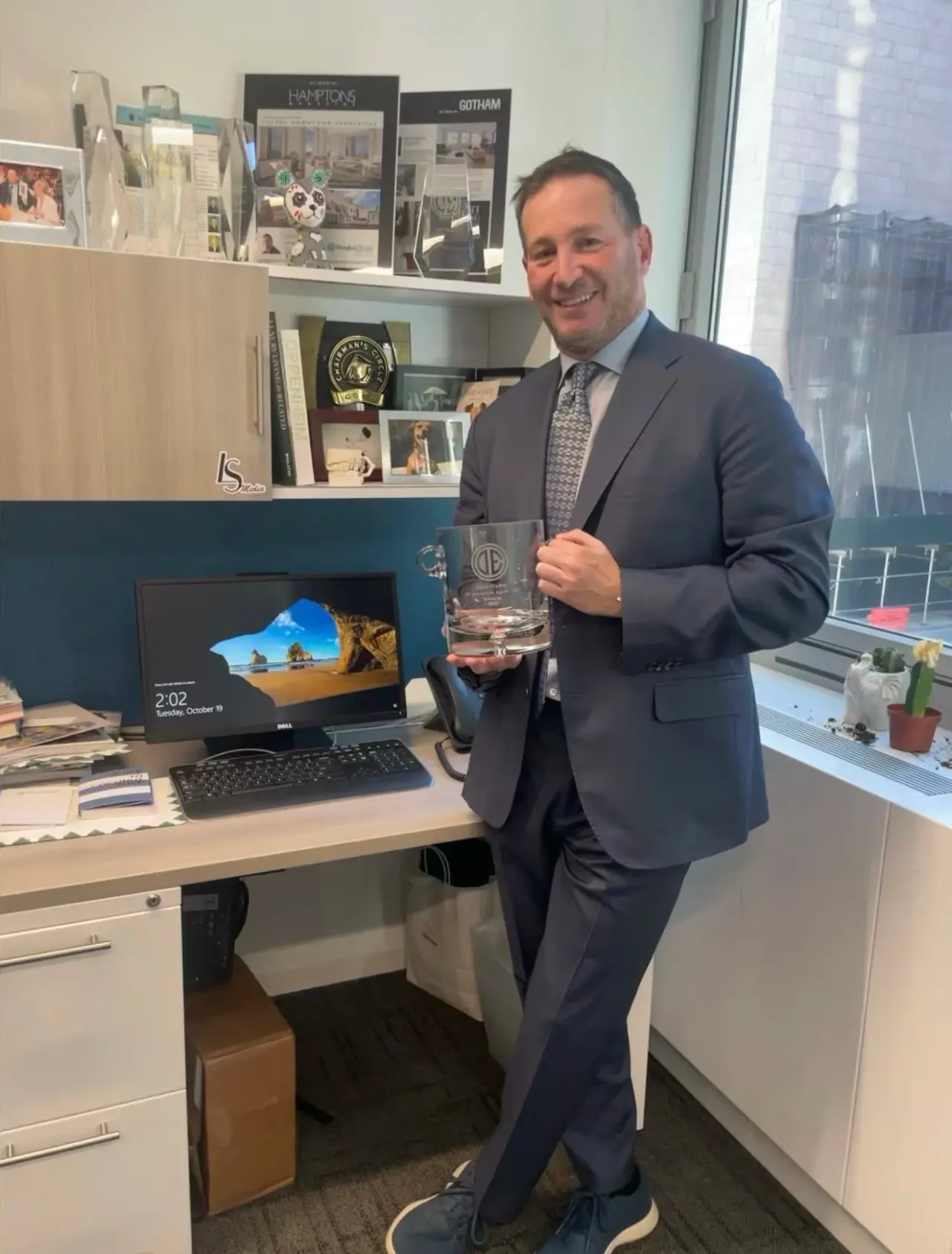 In the office with an award