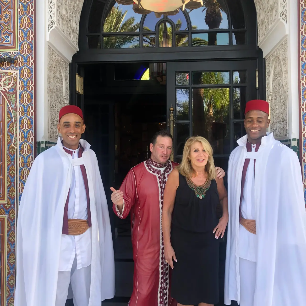 In traditional robes with friends, abroad