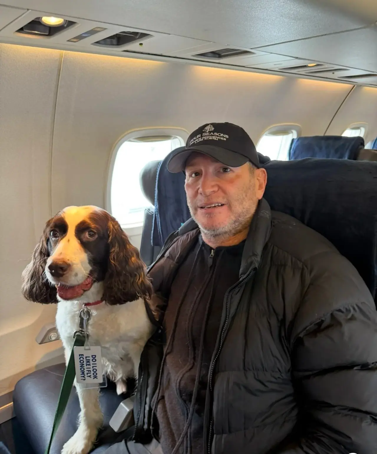 On a flight with his spaniel