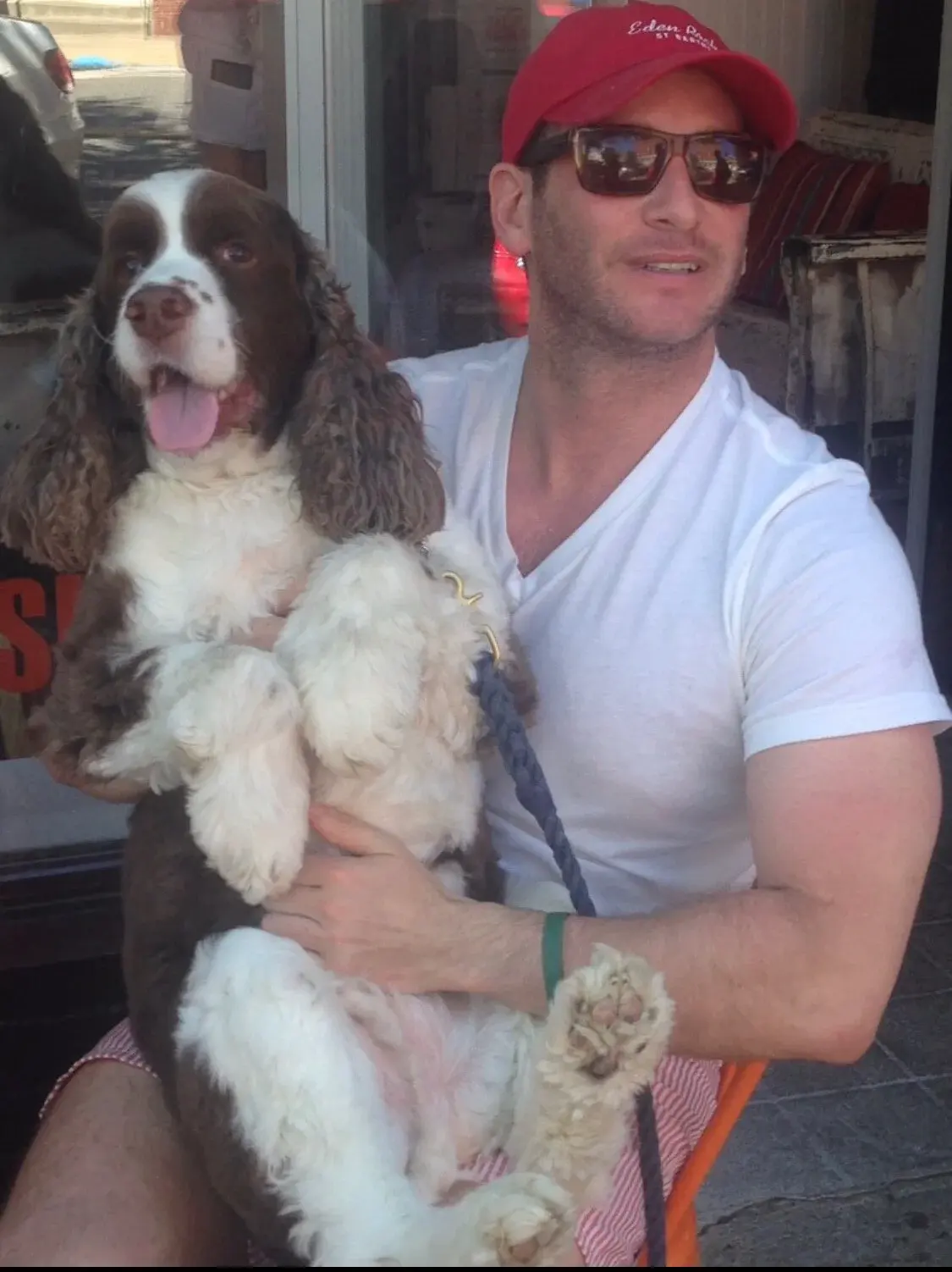 With his spaniel on the street