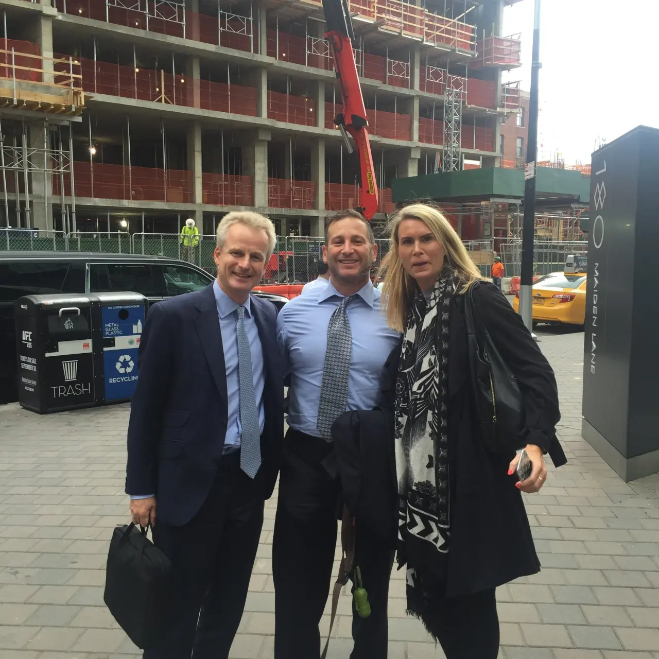 With clients on a Manhattan street