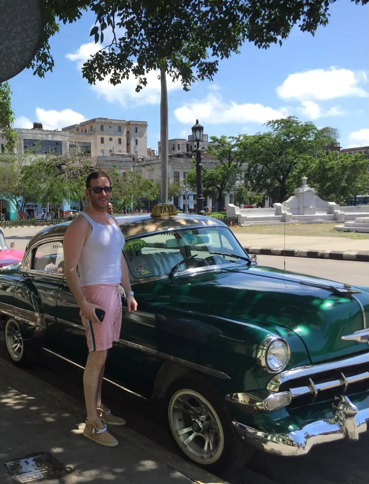 Beside a vintage car