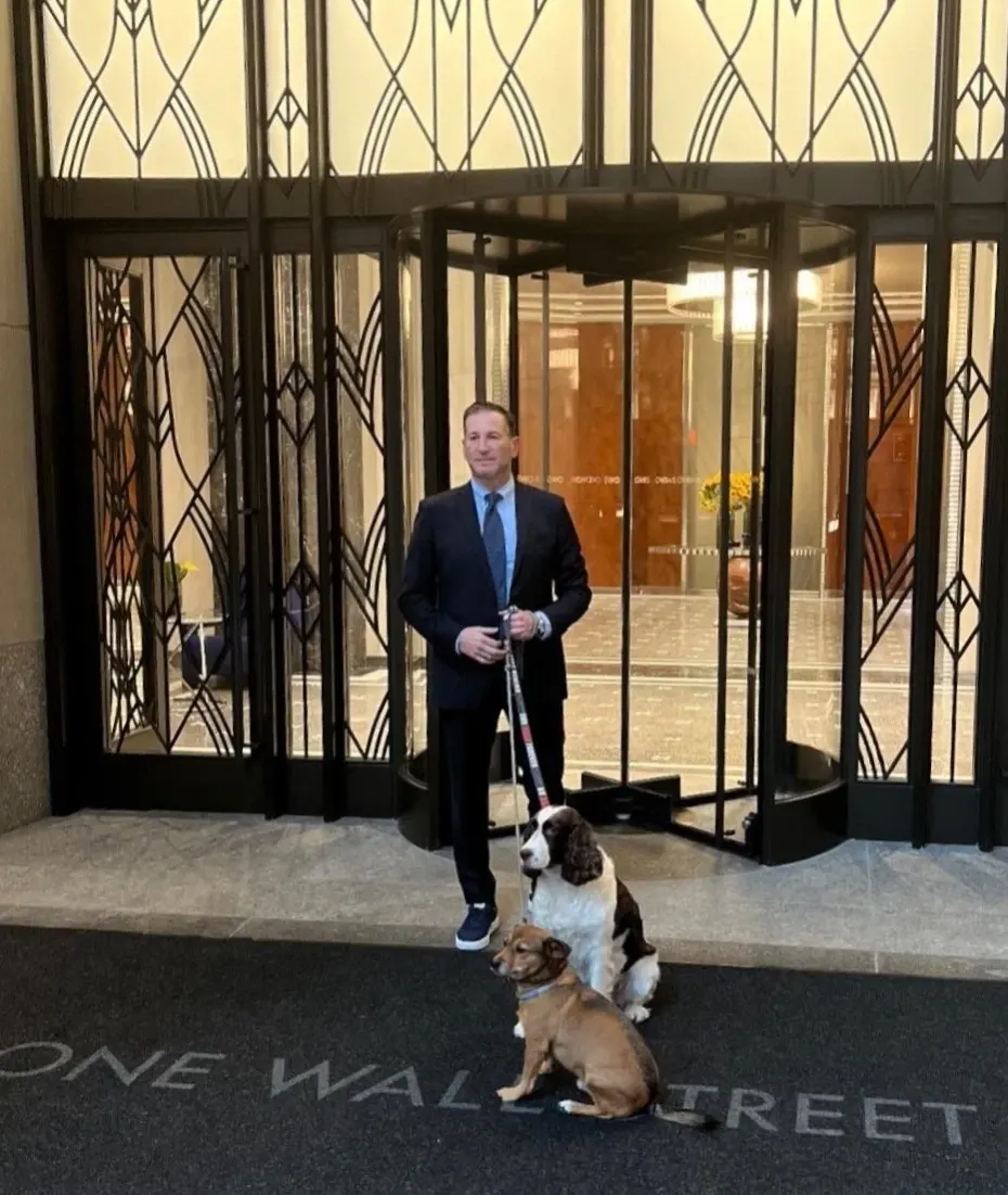 Outside One Wall Street with his dog
